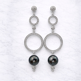 купить Золотые серьги с жемчугом и бриллиантами 0,73 карат в Москве