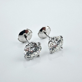 купить Золотые серьги-пусеты с природными бриллиантами 3,09 карат в Москве