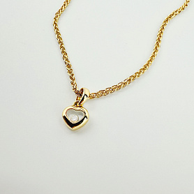 купить Золотая подвеска бренда Chopard Happy Diamonds 79/4854-0001 в Москве