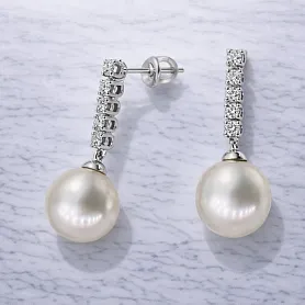 купить Золотые серьги с жемчугом и бриллиантами  в Москве