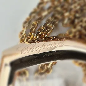купить Золотая подвеска бренда Chopard Happy Diamonds 799202-5003 в Москве
