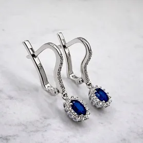 купить Золотые серьги с сапфирами и бриллиантами 0,22 карат в Москве