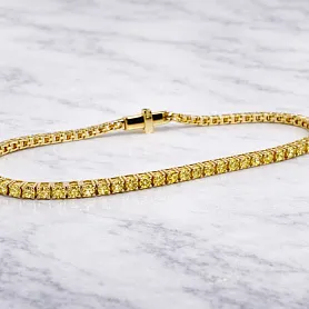 купить Золотой теннисный браслет с жёлтыми сапфирами 3,46 карат в Москве