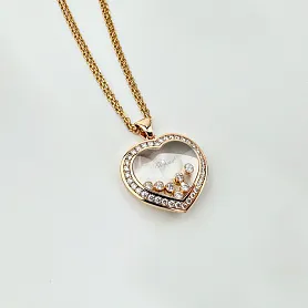 купить Золотая подвеска бренда Chopard Happy Diamonds 799202-5003 в Москве
