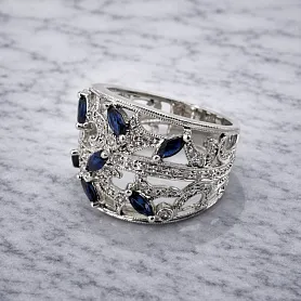 купить Золотое кольцо с сапфирами и бриллиантами 0,25 карат в Москве