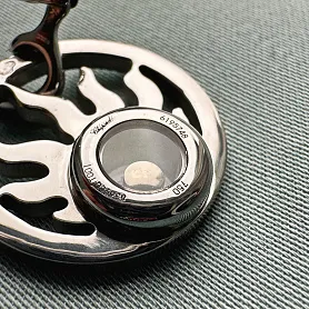 купить Серьги бренда Chopard Happy Diamonds Sun в Москве