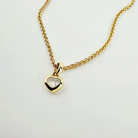 купить Золотая подвеска бренда Chopard Happy Diamonds 79/4854-0001 в Москве